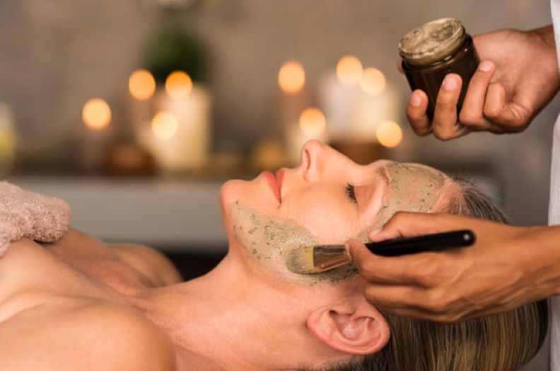 woman with clay mask